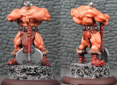 Front and back views of a painted muscular fantasy miniature on a rocky base.