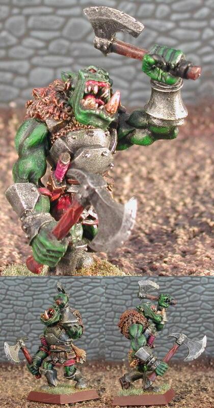Photo of a painted green orc warrior miniature with hammer and cleaver, front and back views.
