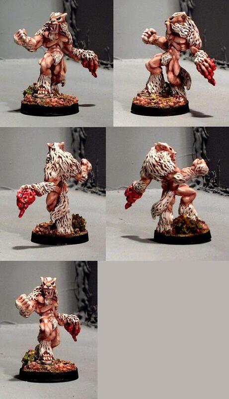 Six views of a painted grotesque miniature with red claws on a round base.